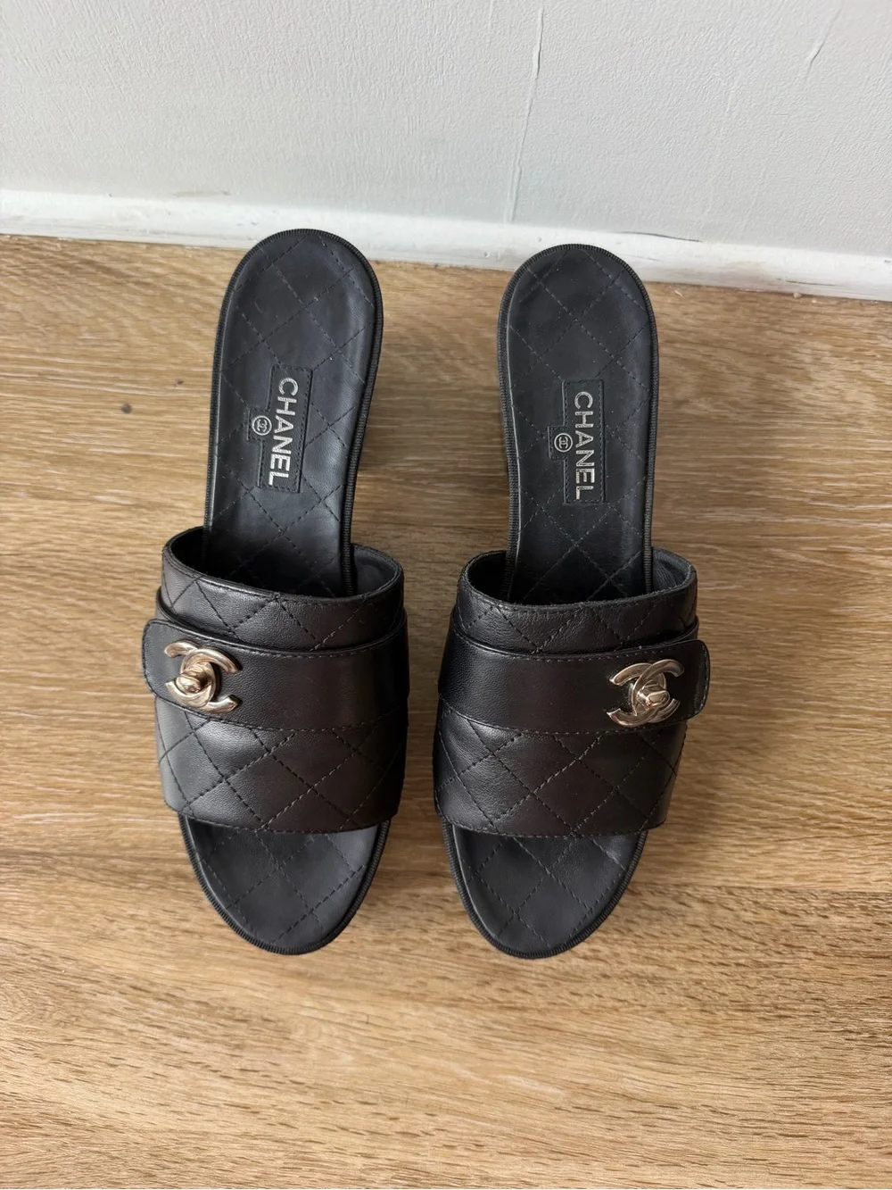 CHANEL Black Quilted Leather Slide Mules